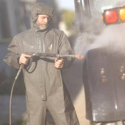 Guy Cotten Isocomb Full Body Green Waterproof Suit in use pressure washing